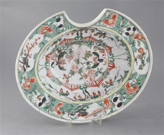 A Chinese export famille verte oval barbers bowl, Kangxi period, width 35.5cm, faults